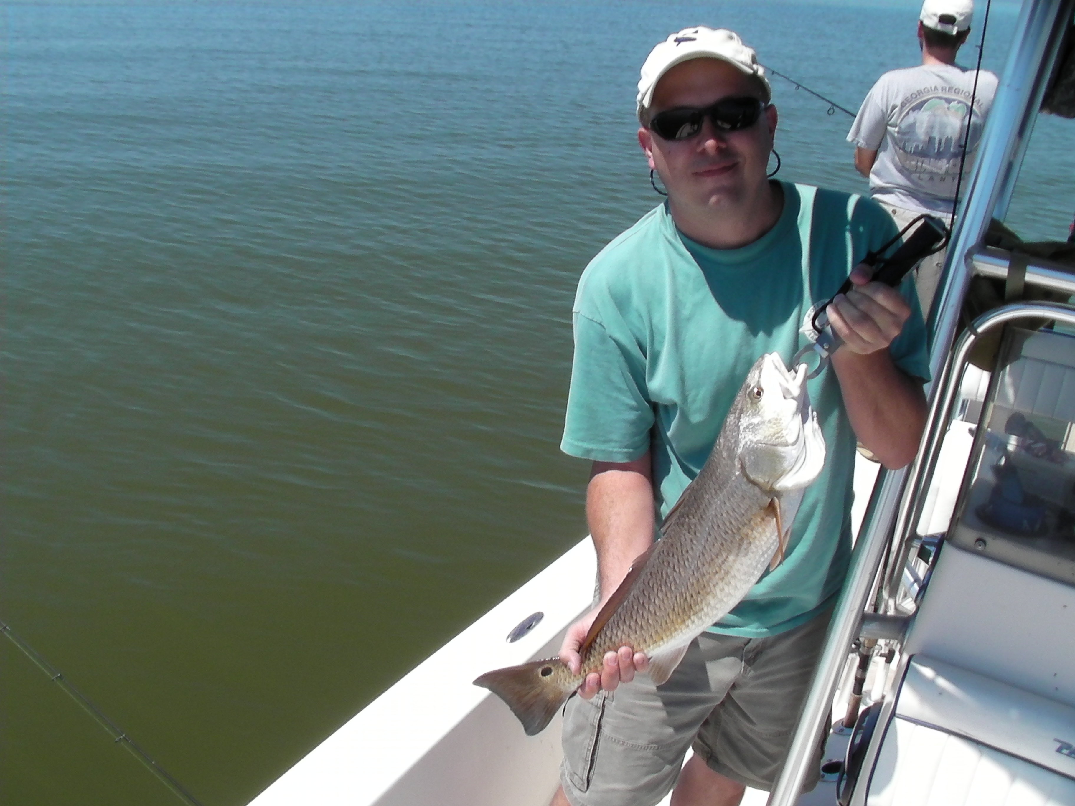 Redfish Caught in Green Clear Water