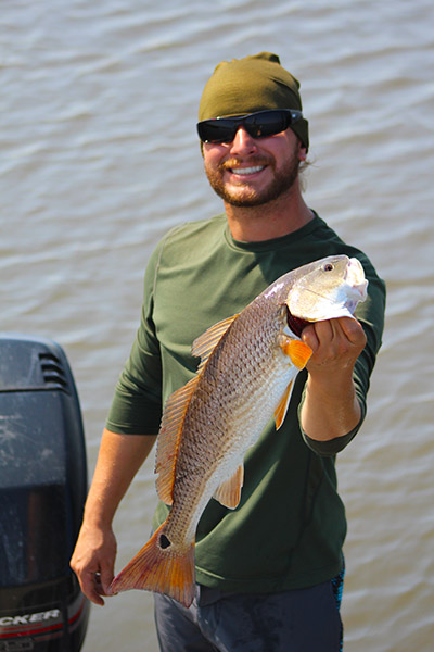 Man holding a Redfish Man holding a Redfish