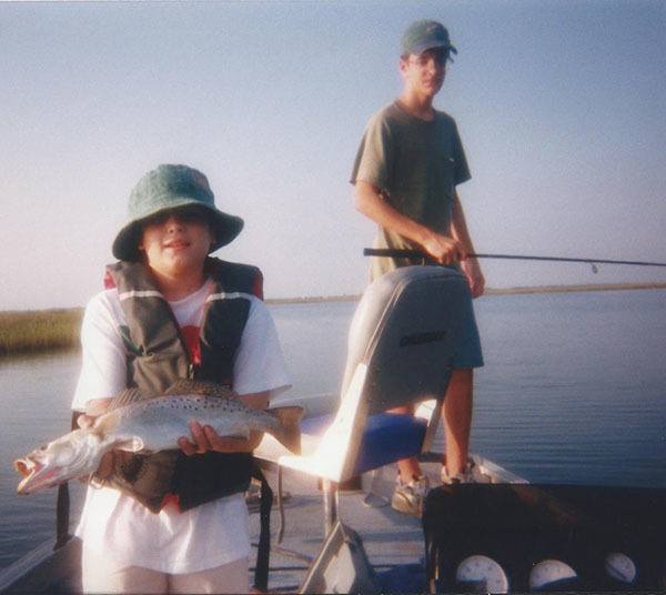 Devin and his brother fishing for speckled trout