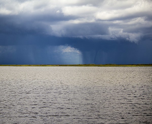 waterspout over marsh